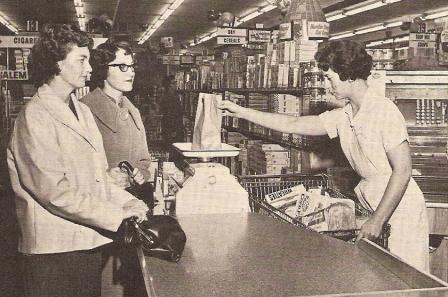 Market in Salem, Oregon, circa 1962. Smiles people! Smiles!